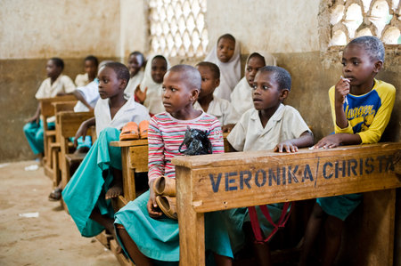African children in school at the desks in the classroom Kenyaのeditorial素材