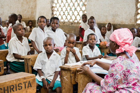 African children in school at the desks in the classroom Kenyaのeditorial素材