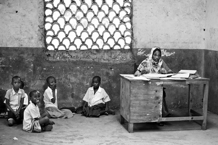 African children in school at the desks in the classroom Kenyaのeditorial素材