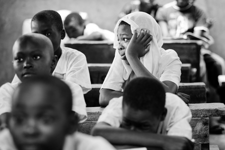 African children in school at the desks in the classroom Kenyaのeditorial素材