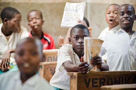 African children in school at the desks in the classroom Kenyaのeditorial素材