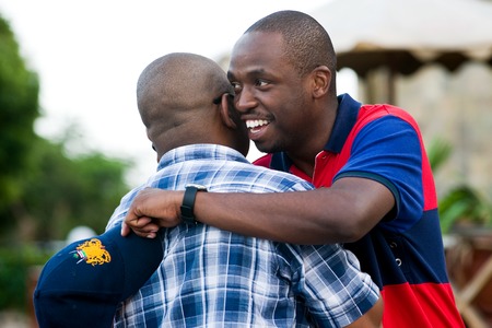 Mombasa. kenya. January 3, 2012.  Black men welcome hugのeditorial素材