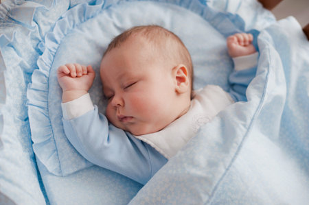 baby sleeps with a cradle at homeの写真素材