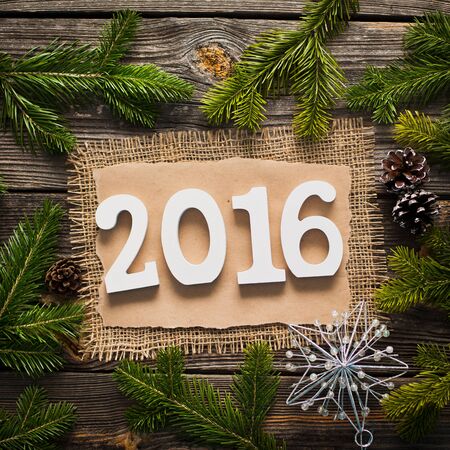 blank sheet for New Year's greetings decorated Christmas tree and pine conesの写真素材