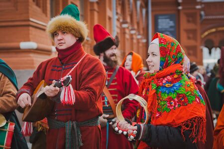 Russia. Moscow.Red square 26 Feb 2017. Carnival Maslenica . participants of the carnival are on the red square playing Russian folk musical instrumentsのeditorial素材