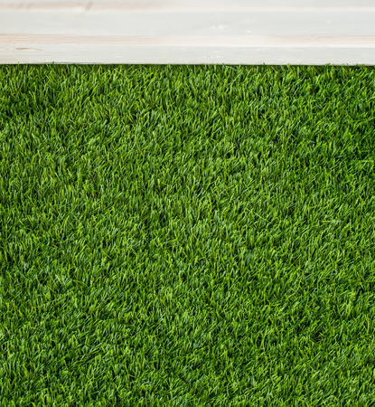 Background green grass top view. Artificial grass or lawn.の写真素材