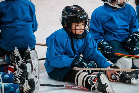 Six-year-old child is engaged in ice hockey. Training. Russia Moscow 30 September 2019のeditorial素材