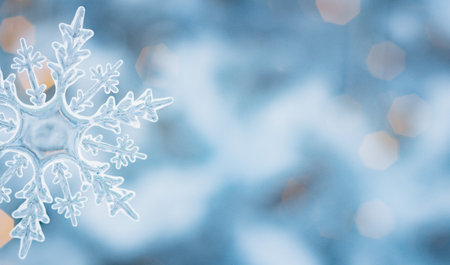 Winter snow background abstract bokeh. Snowflake Close-Up. Free space for text. Christmas, New Year.の写真素材