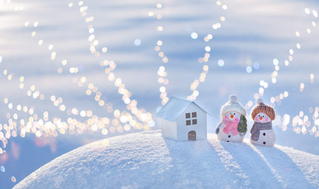 Merry Christmas and New Year greeting card with a space to copy. Happy snowmen standing Christmas...