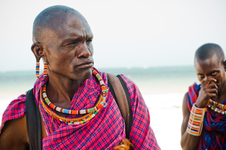 Maasai warrior on the beach Diani Beach, Kenya Mombasa January 26 2012のeditorial素材