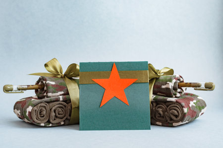Handmade tanks of socks as gift men's military holiday February 23 and a greeting card with a ribbonの写真素材