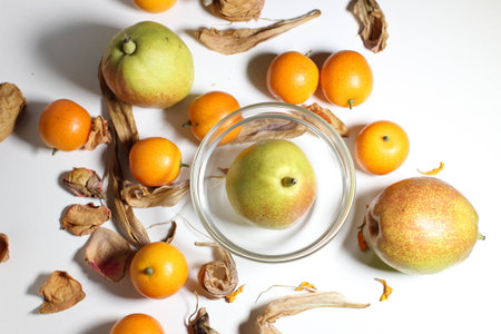 Fruits of pear and kumquatの写真素材