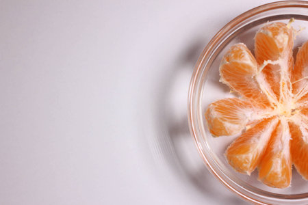  orange in glass bowlの写真素材
