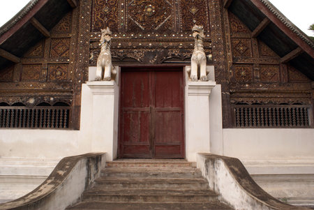 Wooden temple in wat Phra Kaew Don Tao in Lampang, Lanna Thai                 