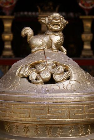 Shrine with lion in buddhist temple in Vietnam                  の写真素材