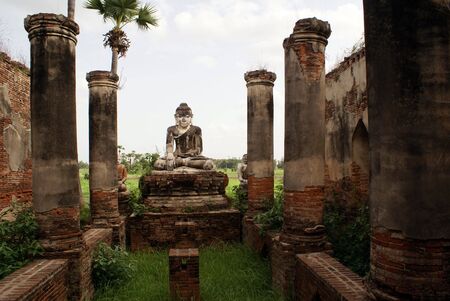 Buddha and ruins in Inwa, Mandalay, Myanmar                の写真素材