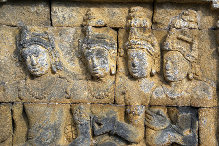 Women on the wall of Borobudur, Java, Indonesia               