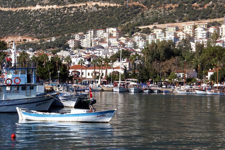 Boats in marina and houses in Kash, Turkey                 の写真素材
