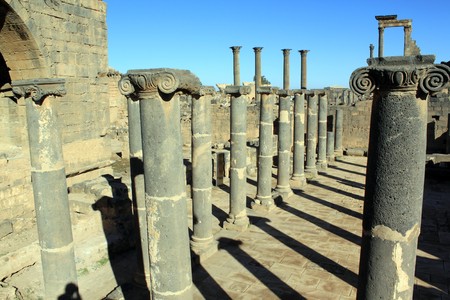 Black basalt columns and ruins in Old Bosra, Syriaの写真素材