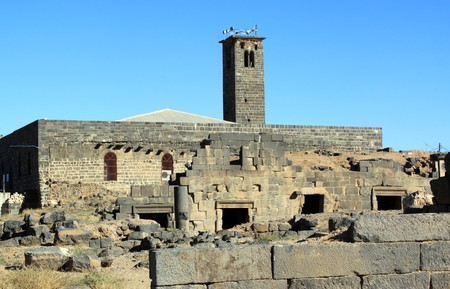 Basalt stone minaret of mosque in Bosra, Syriaの写真素材