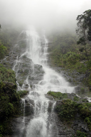 Waterfall in mist in Kinabalu national park in Sabah, Borneo, Malaysia