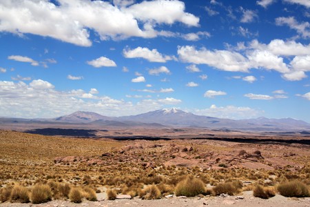 White clouds anmd blue sky in the desert in Boliviaの写真素材