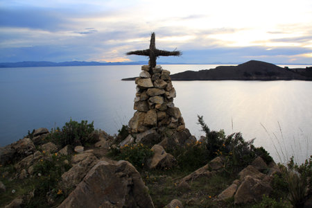 Small cross on the top of mount in island Isla del Sol, Bolivia