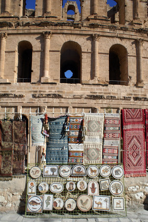 Souvenir mosaics near the wall of roman theater in El-Jem, Tunisia                  の写真素材