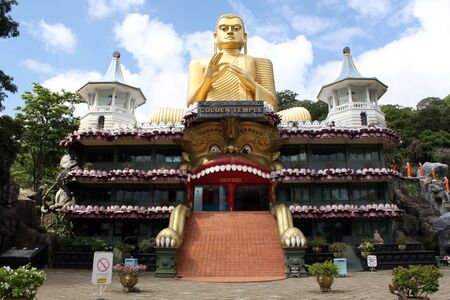 Golden temple and big Buddha in Dambulla, Sri Lankaの写真素材