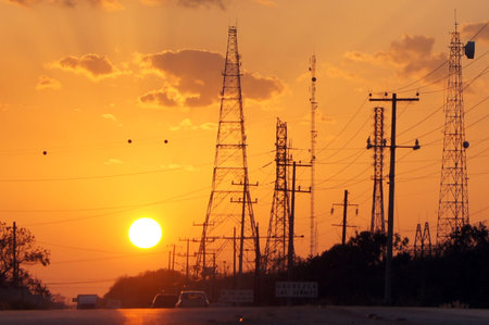 Road, sun and antennas in Mexico                 
