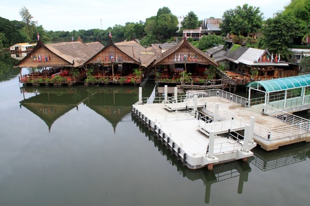 Pier and floating restaurant near bridge on the river Kwai, Thailandのeditorial素材