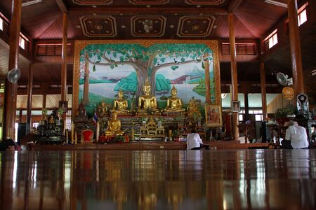 Buddhist shrine inside wooden temple near Mae Hong Son, Thailandのeditorial素材