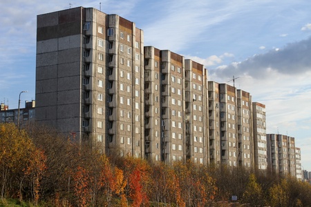 Apartment buldings and trees in autumn Murmansk, Russiaのeditorial素材