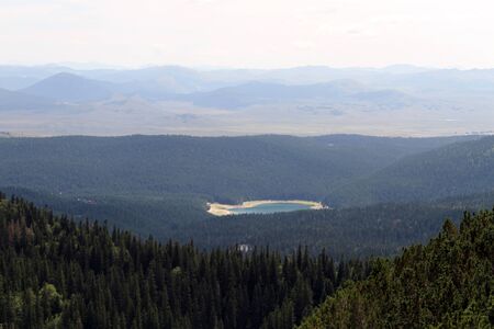 Mountain, forest and Black lake in park Durmitor, Montenegroの写真素材