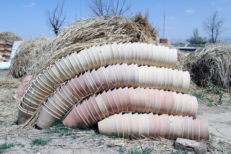Heap of ceramics and hay in Iranの写真素材
