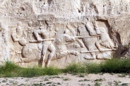 Bas-relief on the wall of royal tomb in Naqsh-e Rostam, Iran の写真素材
