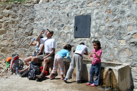 FETHYE, TURKEY - CIRCA APRIL 2013 People drinking water from springのeditorial素材