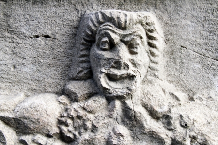 Greek theater mask on the stone in ancient theater in Myra, Turkeyの写真素材