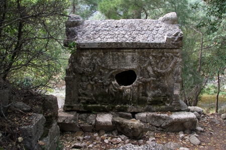 Stone sarcophagus under trees in Olimpos, Turkeyの写真素材