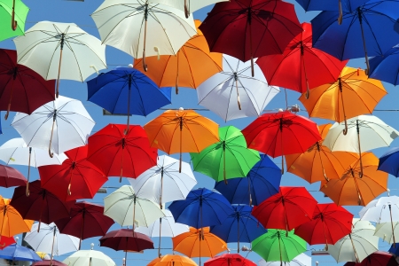 Many color umbrellas on the skyの写真素材
