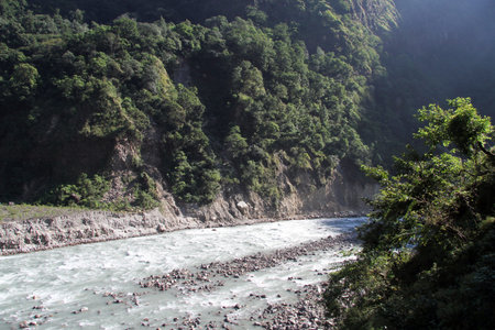 Sunlight and mountain river in Nepal