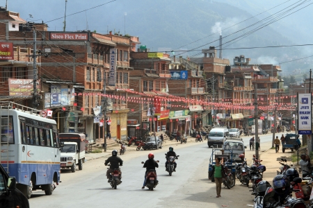 BHAKTAPUR, NEPAL - CIRCA NOVEMBER 2013 Traffic on the main roadのeditorial素材