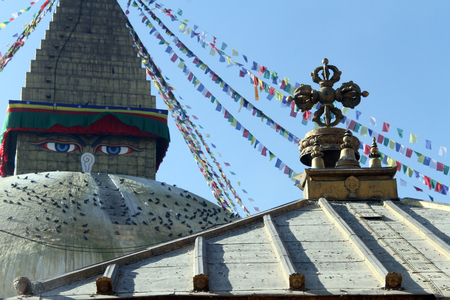 Stupa Bodnath and roof of shrine in Kathmandu, Nepalの写真素材