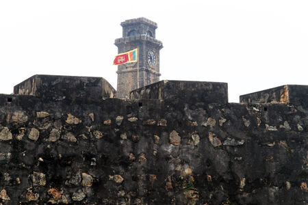 Walls of fort Galle and flag in Sri Lankaの写真素材