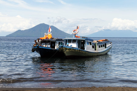 Two tourist boats near beach of Krakatau in Indonesia