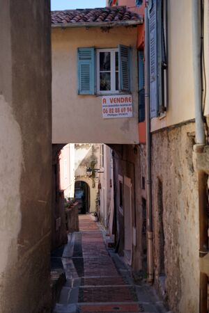 MENTON, FRANCE - CIRCA JULY 2015 Narrow street in Old townのeditorial素材