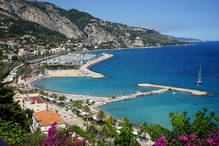 Port and beach in Menton, Franceの写真素材