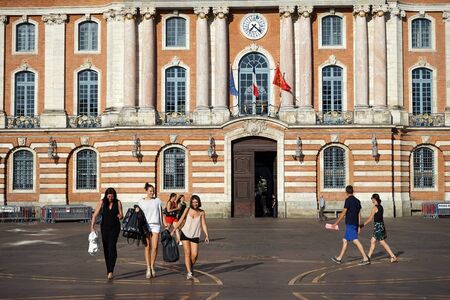 TOULOUSE, FRANCE - CIRCA JULY 2015 People walk on the Capitol square near Town Hallのeditorial素材