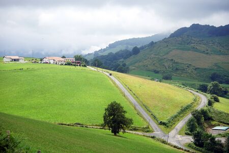 Green hills near Pyrenee mountain in Franceの写真素材