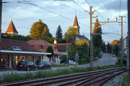 MURTEN, SWITZERLAND - CIRCA AUGUST 2015 Railway near street